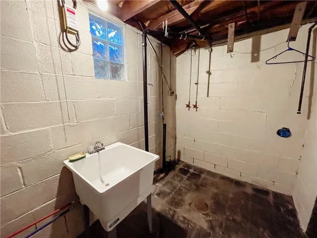a bathroom with a sink and a shower