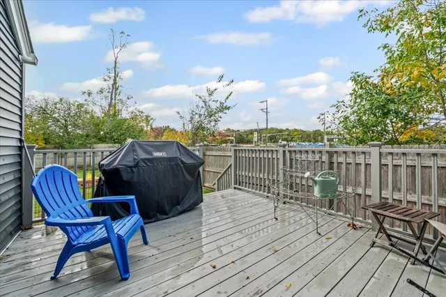 a view of a chairs on the roof deck