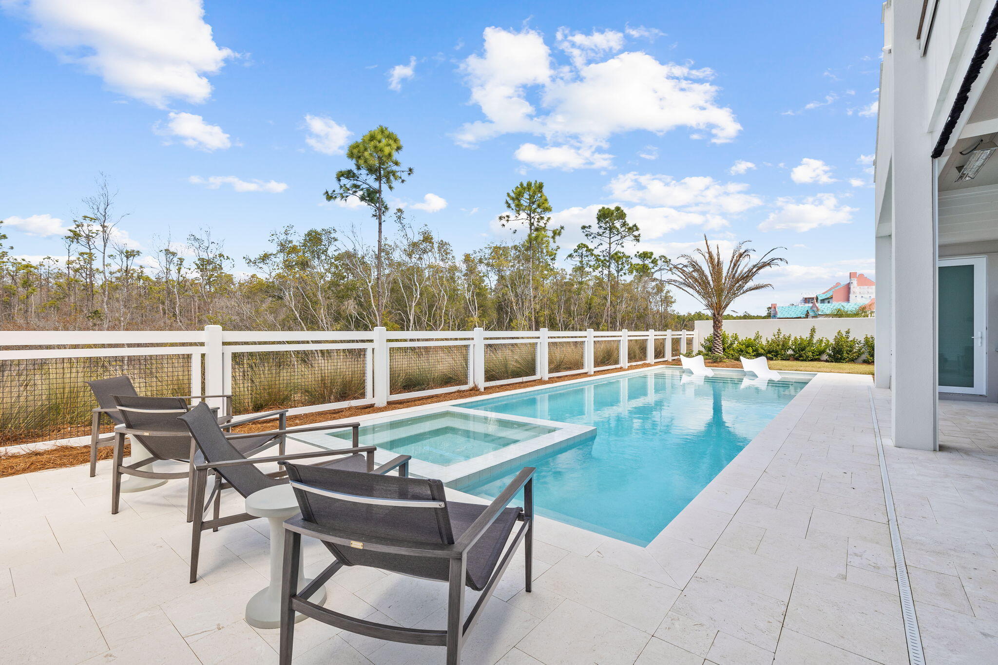 450 Windsong Dr Inlet Beach Inlet Beach, FL 32461 - Photo 11 of 90 a view of a chairs and table in the terrace
