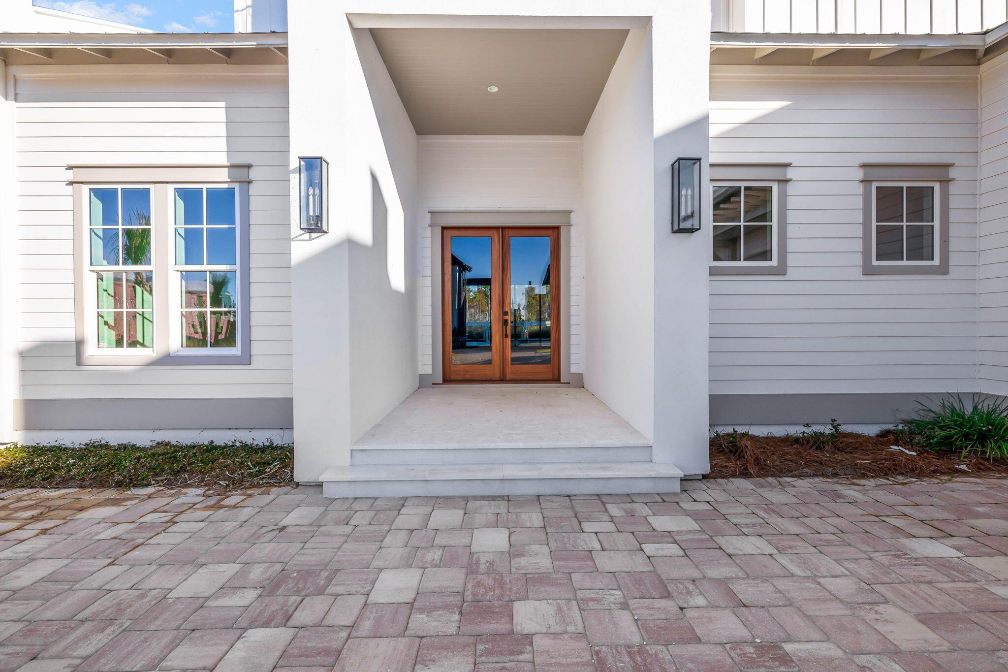 450 Windsong Dr Inlet Beach Inlet Beach, FL 32461 - Photo 3 of 90 a view of entrance of the house with potted plants