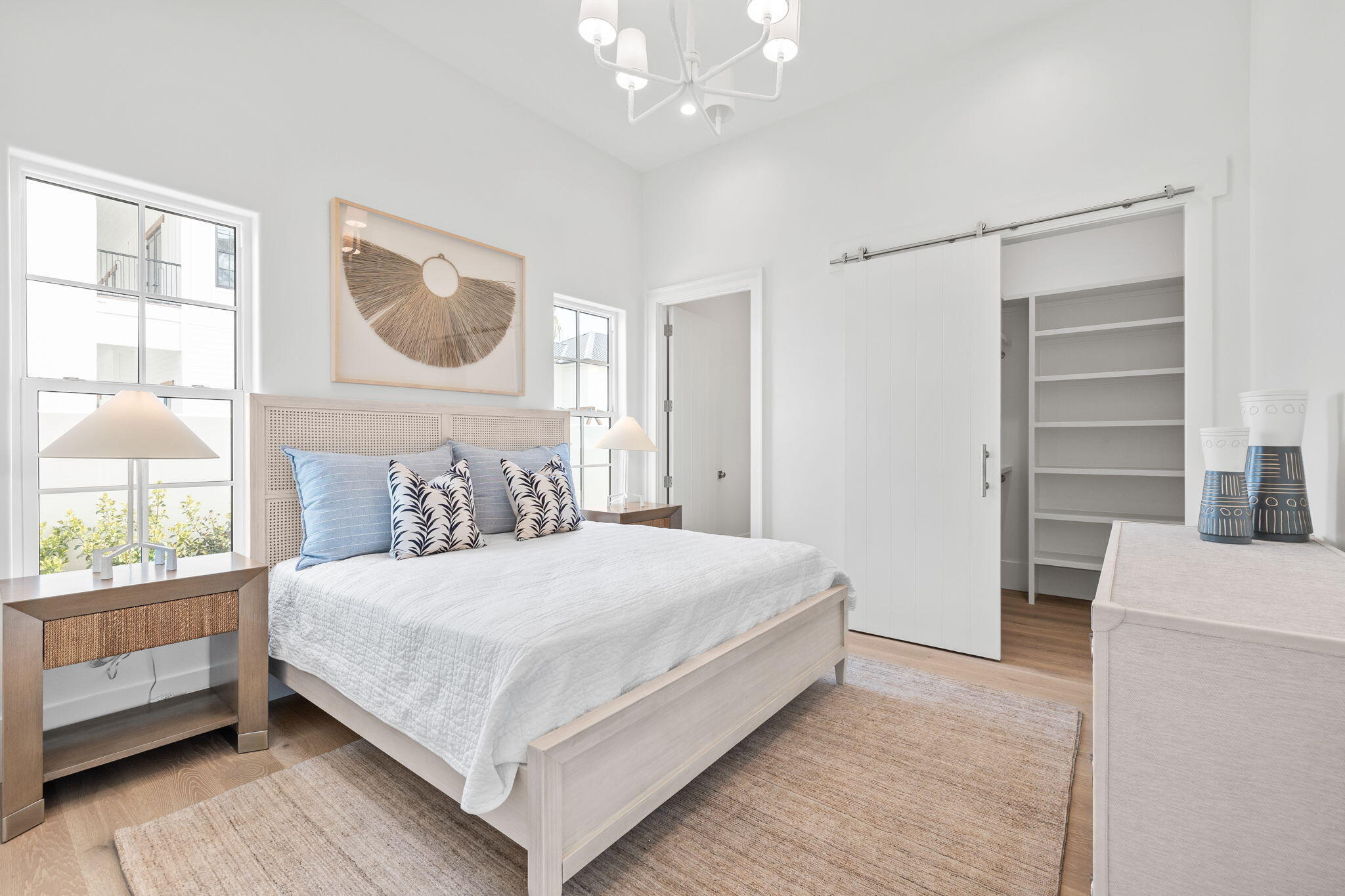 450 Windsong Dr Inlet Beach Inlet Beach, FL 32461 - Photo 35 of 90 a bedroom with a large bed and a window