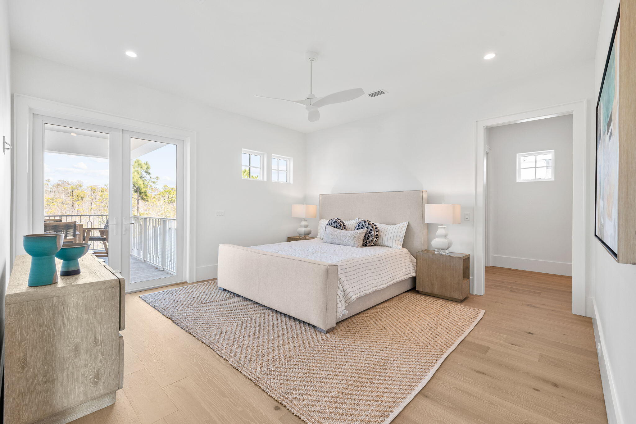 450 Windsong Dr Inlet Beach Inlet Beach, FL 32461 - Photo 54 of 90 a bedroom with a large bed and a couch