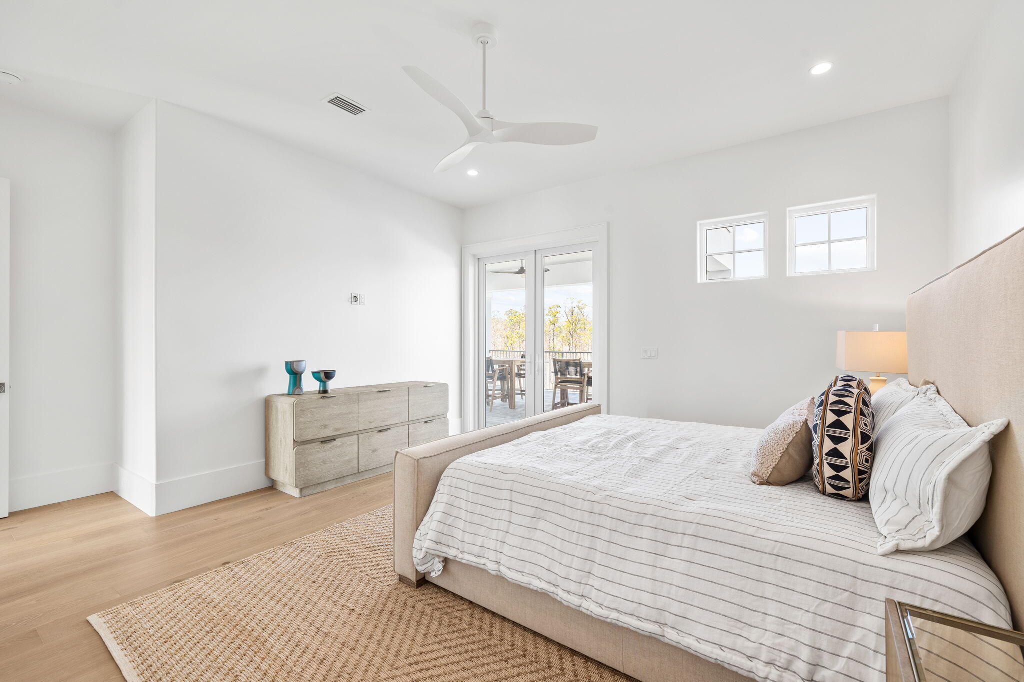 450 Windsong Dr Inlet Beach Inlet Beach, FL 32461 - Photo 56 of 90 a bedroom with a large bed and a window
