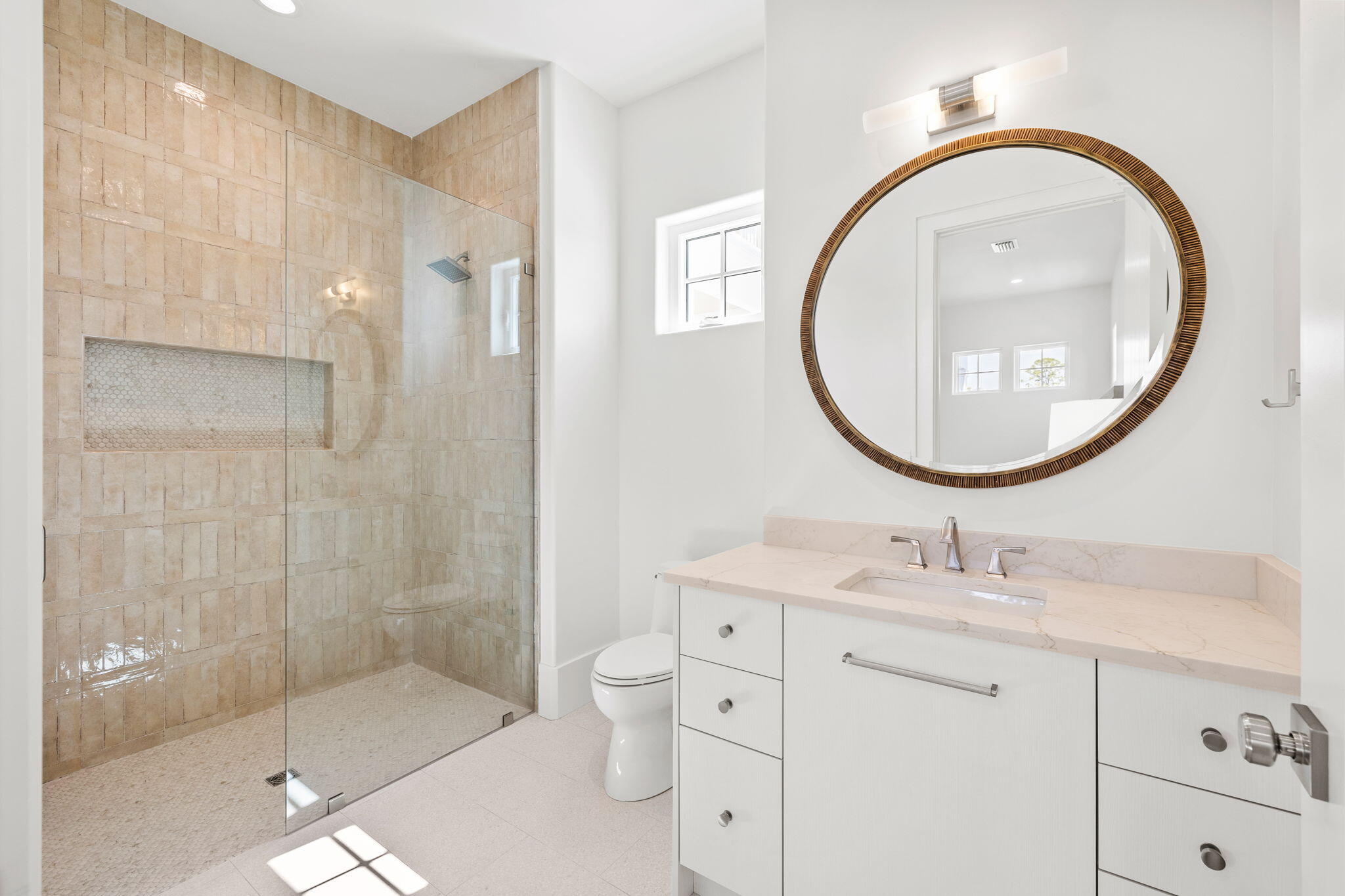 450 Windsong Dr Inlet Beach Inlet Beach, FL 32461 - Photo 62 of 90 a bathroom with a sink a mirror a vanity and a shower