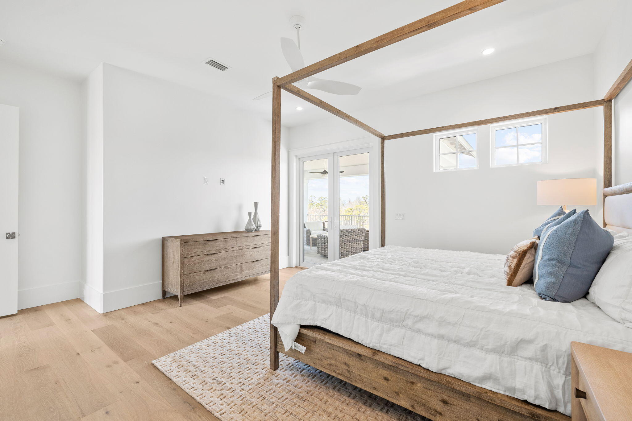 450 Windsong Dr Inlet Beach Inlet Beach, FL 32461 - Photo 69 of 90 a bedroom with a bed and wooden floor