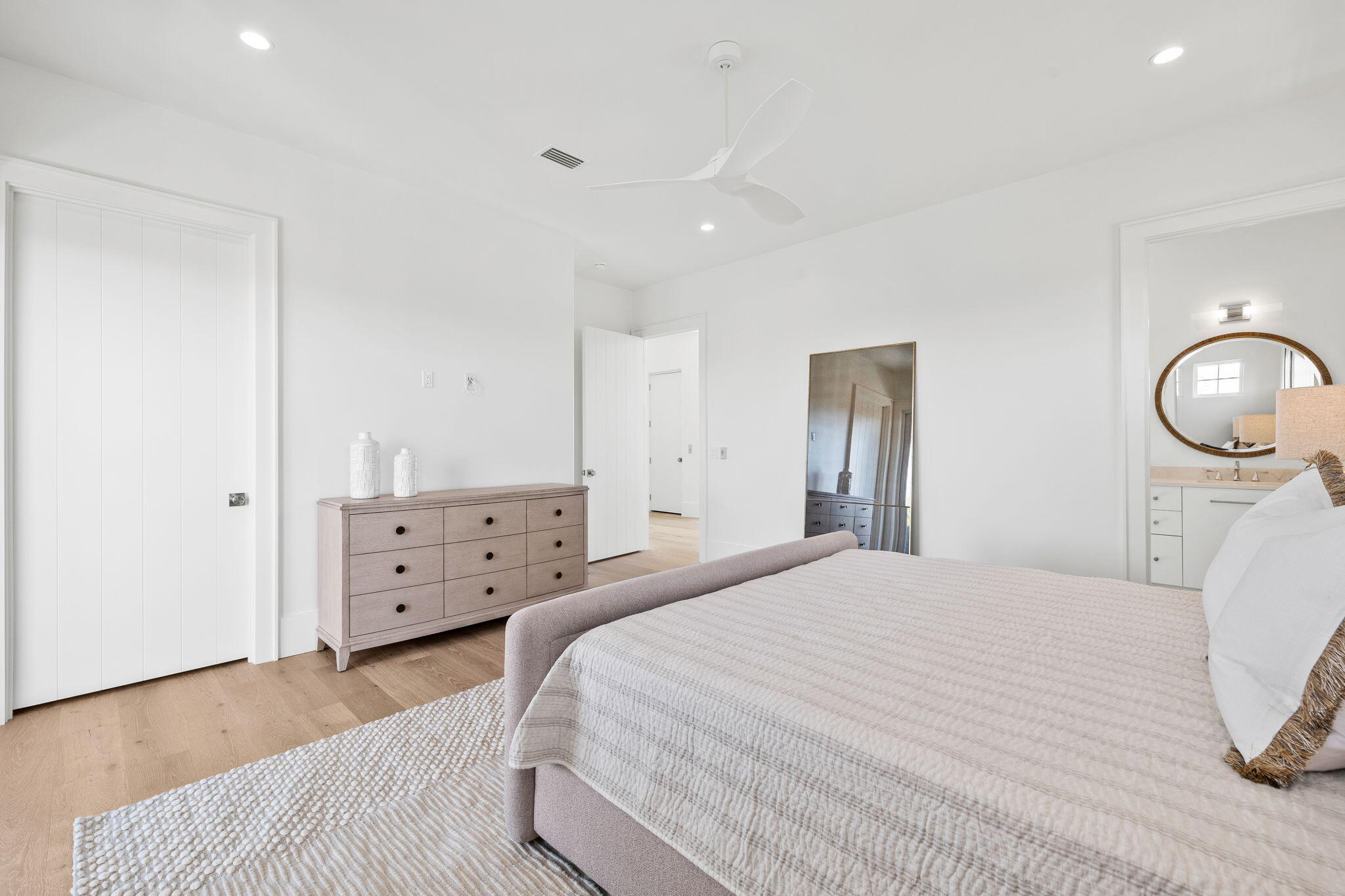 450 Windsong Dr Inlet Beach Inlet Beach, FL 32461 - Photo 72 of 90 a bedroom with a bed and a chandelier