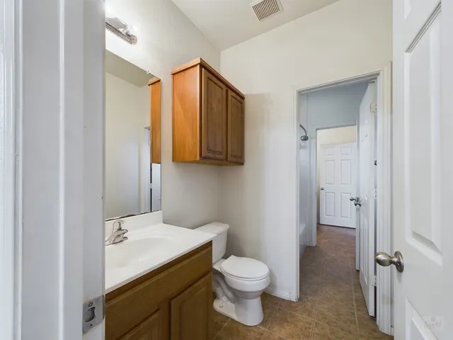 a bathroom with a sink and a toilet
