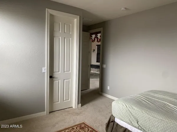 a bathroom with a double vanity sink and mirror