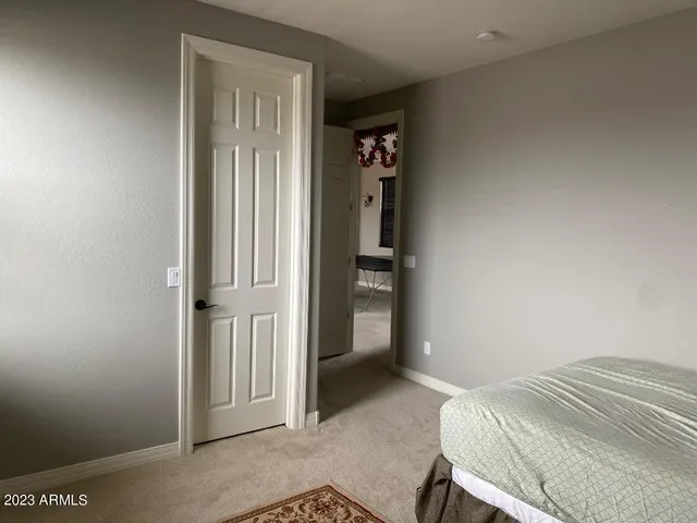 a bathroom with a double vanity sink and mirror