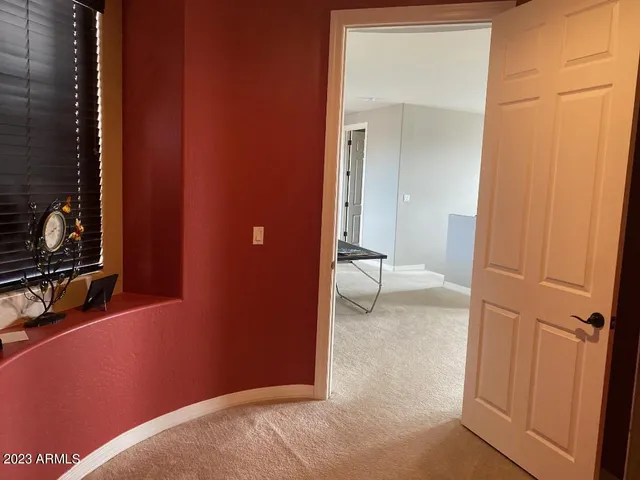 a view of a room that has a sink and toilet