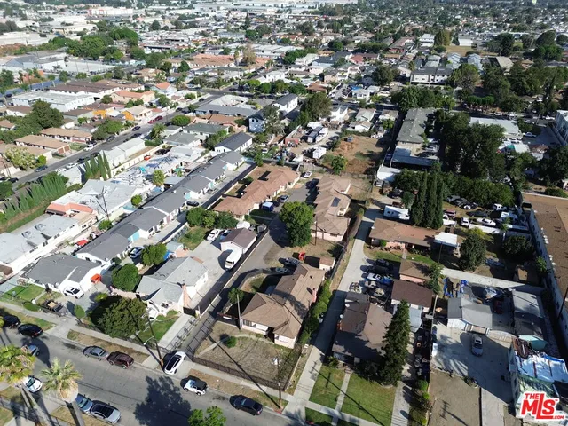 an aerial view of a city with lots of residential buildings