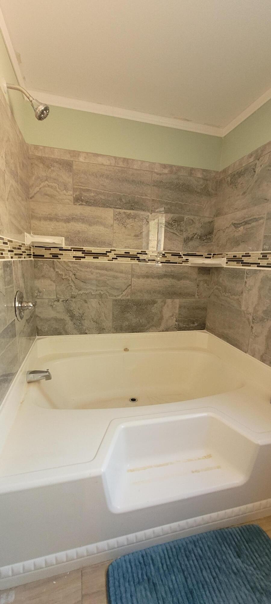744 Crooks Creek Road Selma, OR 97538 - Photo 6 of 18 New custom tile master shower & huge tub with built in shelves