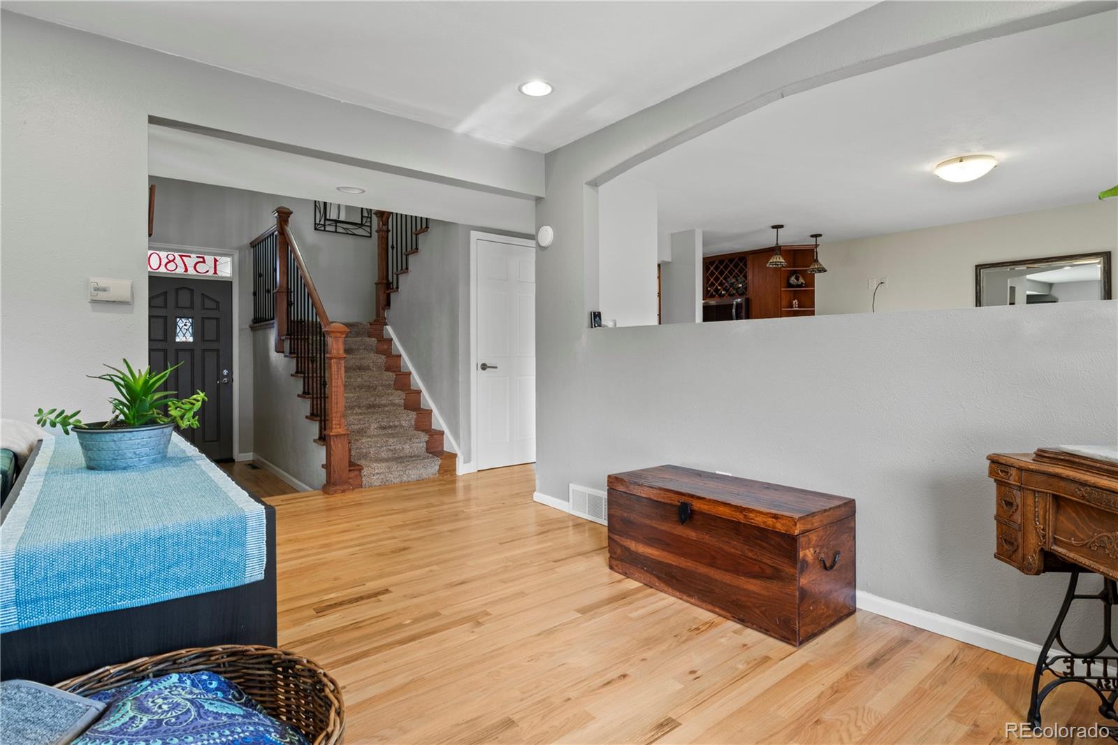 15780 Sandtrap Way Morrison, CO 80465 - Photo 14 of 36 a room with furniture and a potted plant