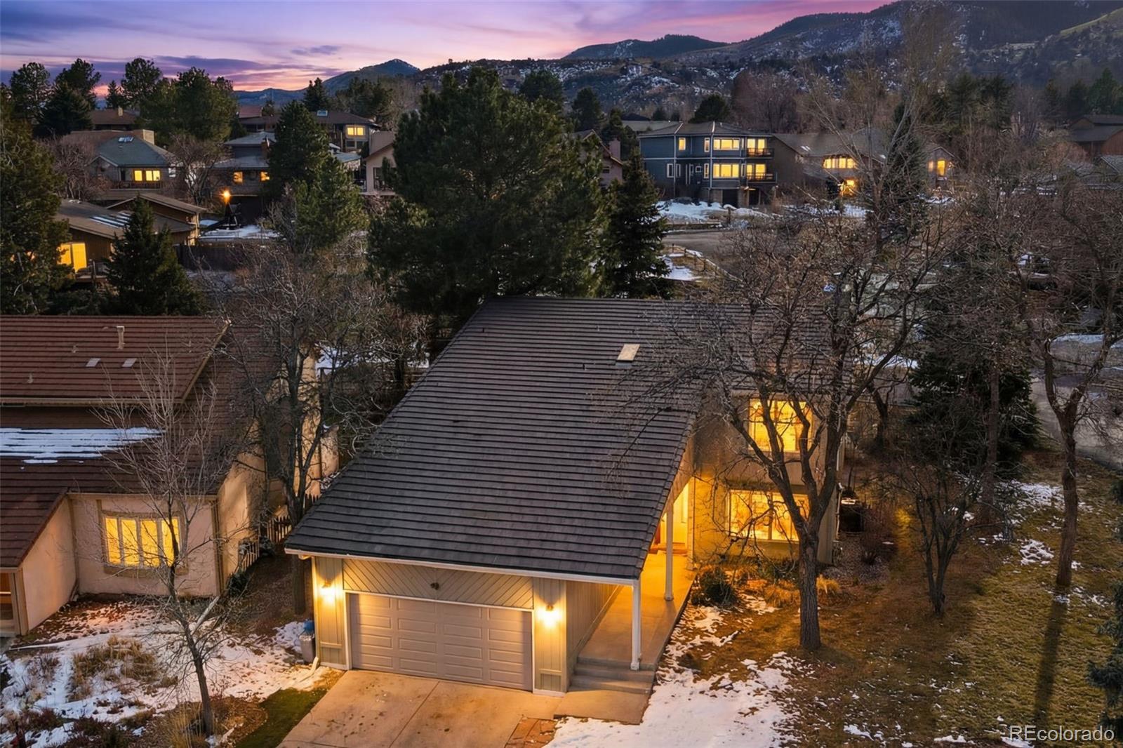 15780 Sandtrap Way Morrison, CO 80465 - Photo 2 of 36 a view of a house with a yard