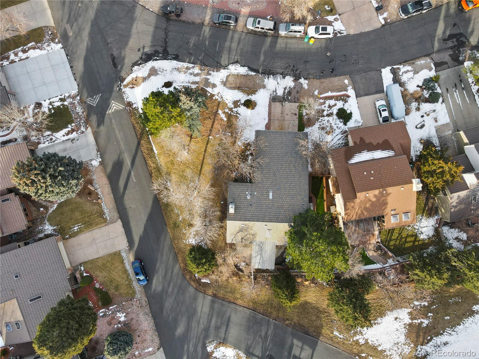 15780 Sandtrap Way Morrison, CO 80465 - Photo 35 of 36 an aerial view of residential houses with outdoor space