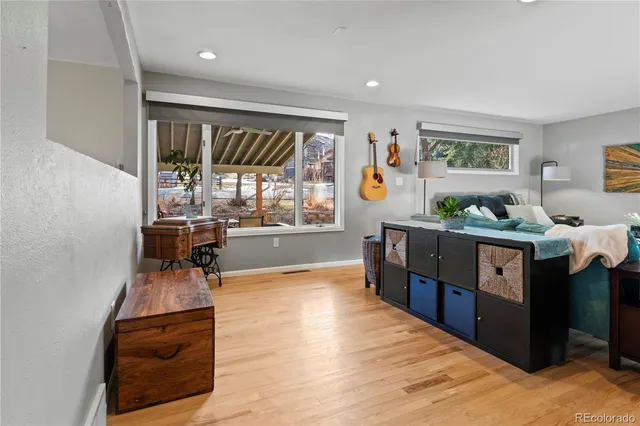 a room with furniture and a large window