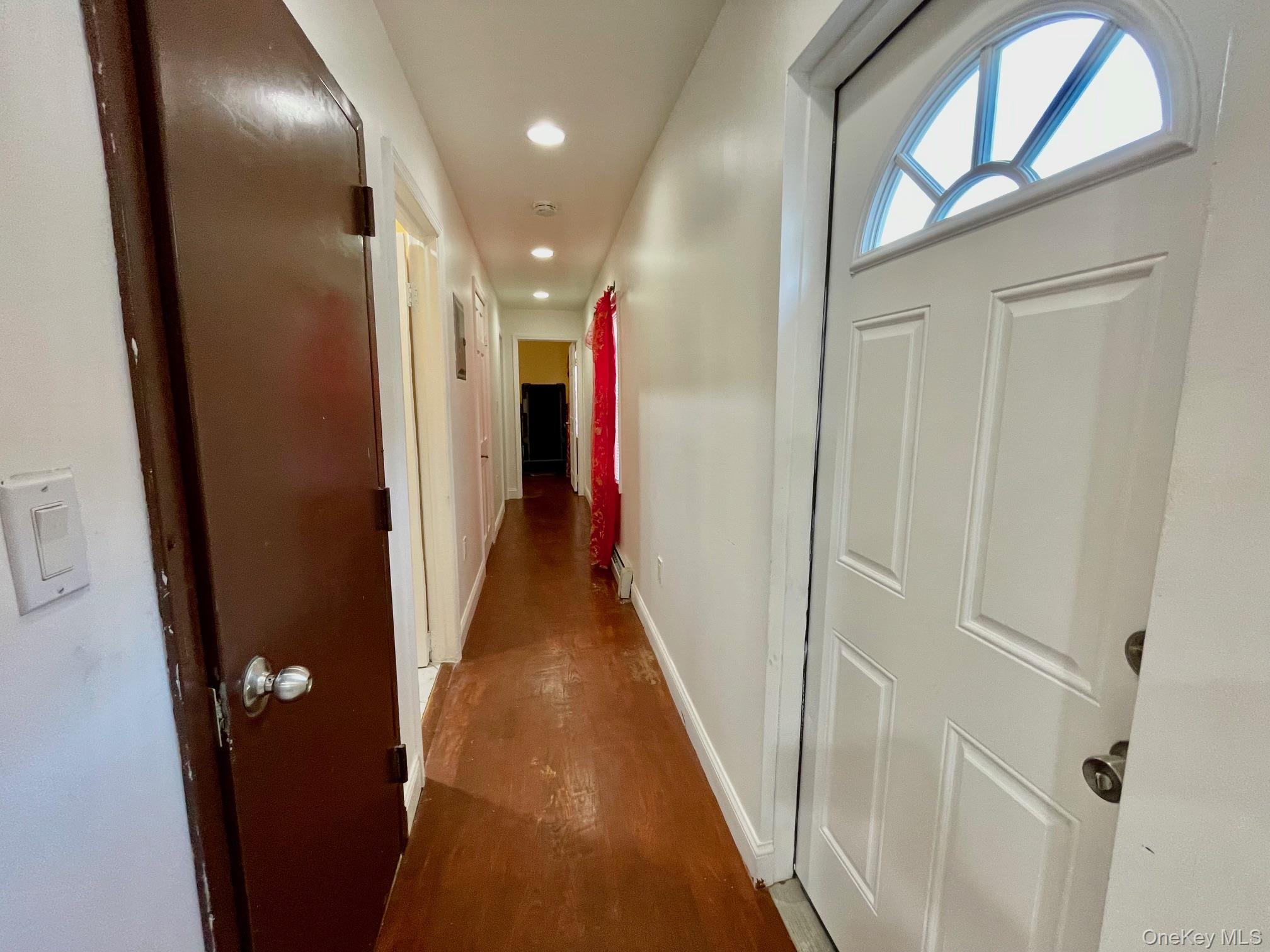 102-03 Rau Court Queens, NY 11414 - Photo 7 of 12 a view of hallway with stairs