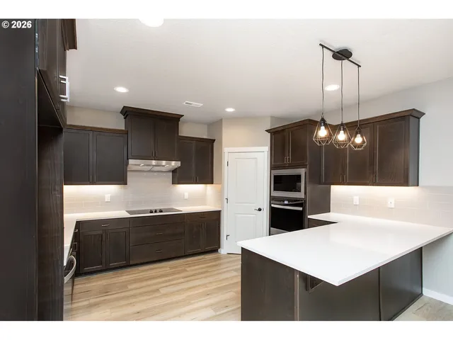 a hallway with cabinets
