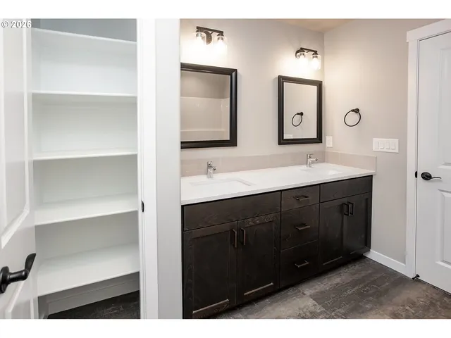 a view of a house with backyard and porch