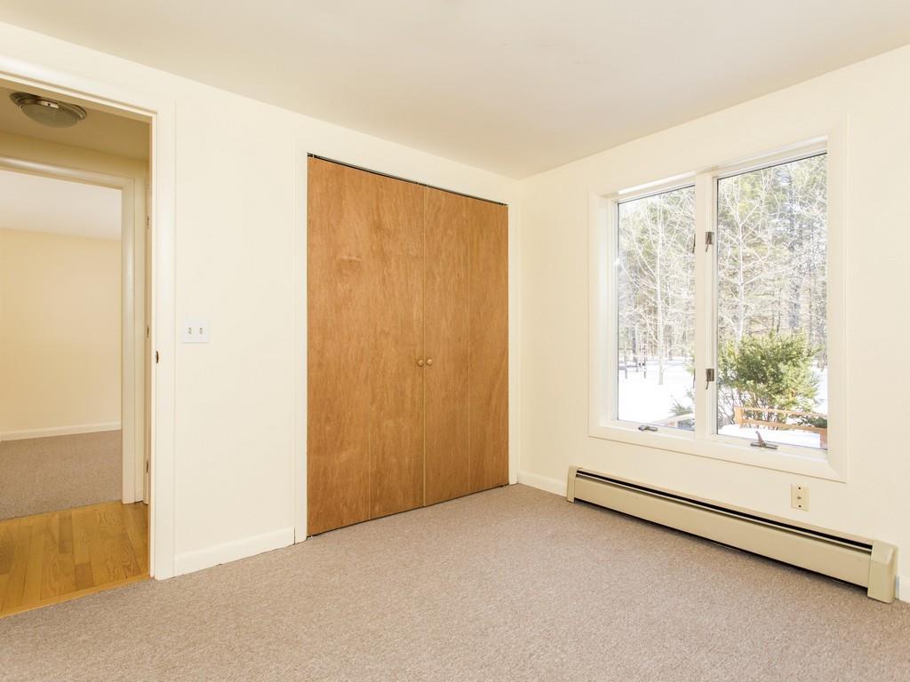 149 Black Point Road New Gloucester, ME 04260 - Photo 21 of 34 The second first floor bedroom also...