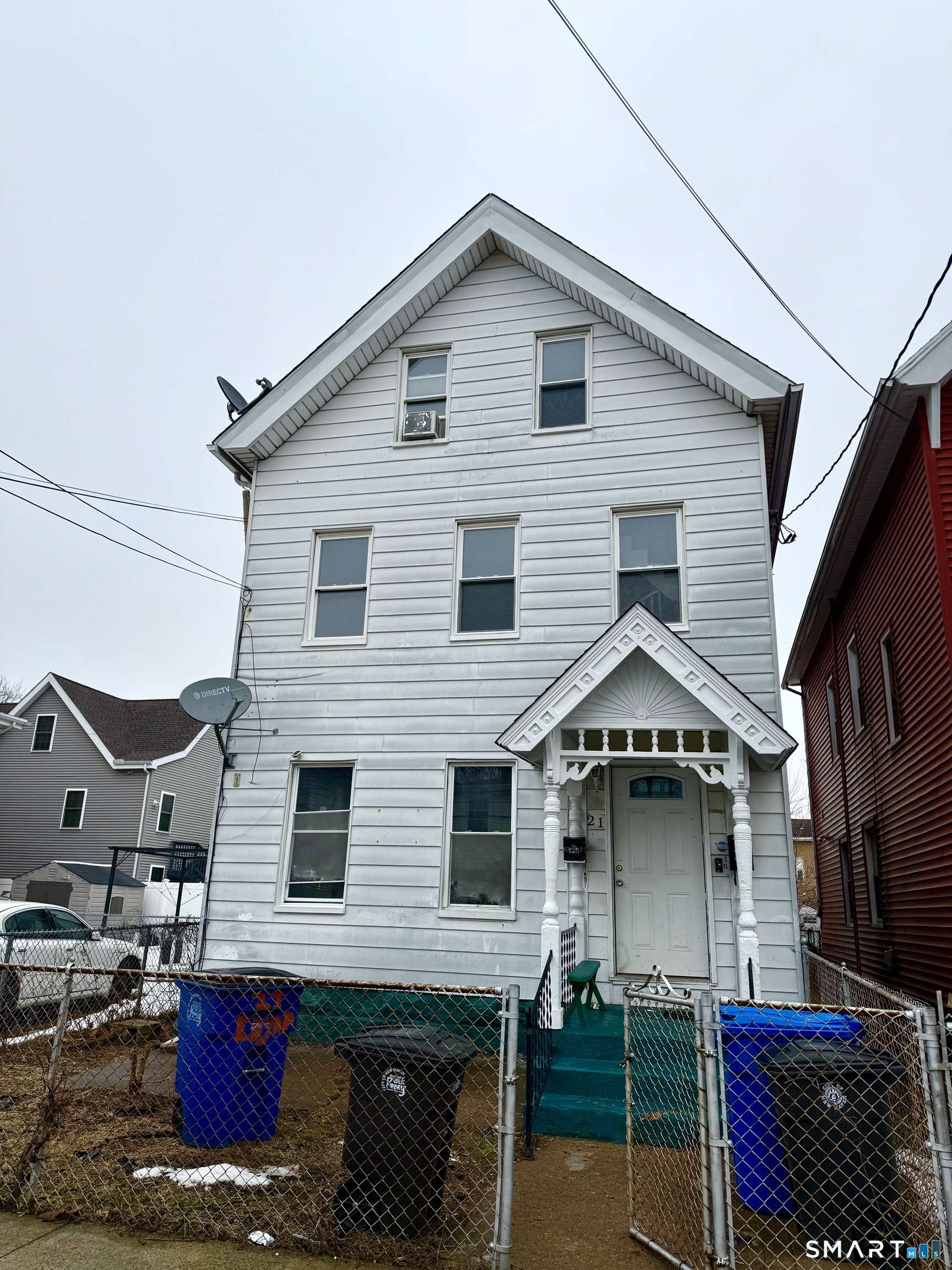 21 Edgar Street, Unit 2 New Haven, CT 06519 - Photo 1 of 20 a front view of a house with parking
