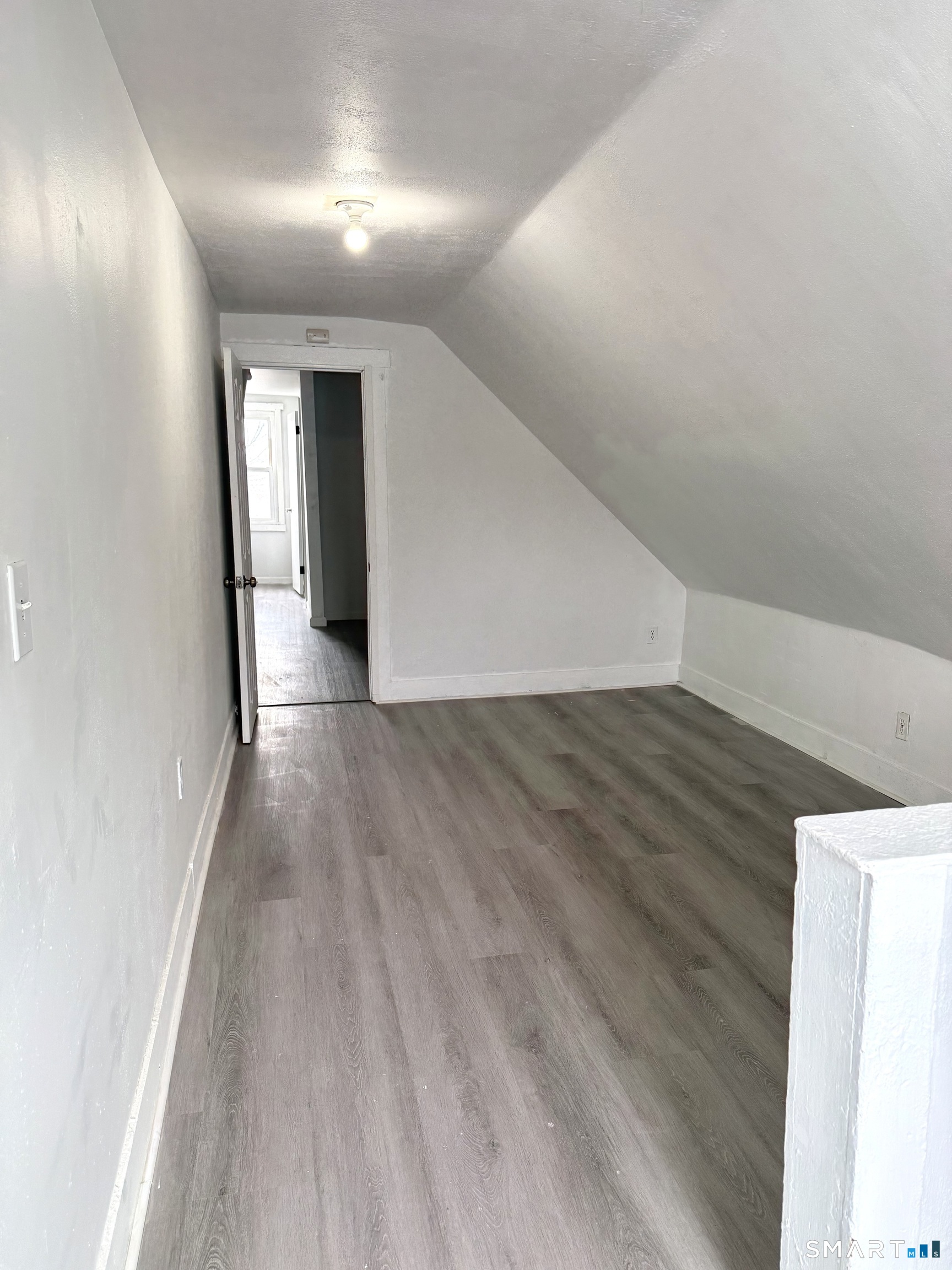 21 Edgar Street, Unit 2 New Haven, CT 06519 - Photo 11 of 20 a view of a hallway with wooden floor