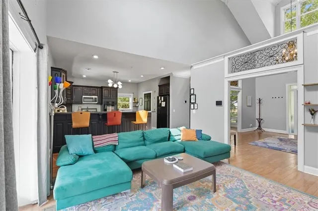 a living room filled with furniture and a fireplace