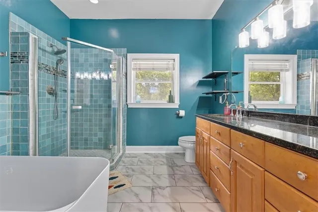 a workspace with furniture window and wooden floor