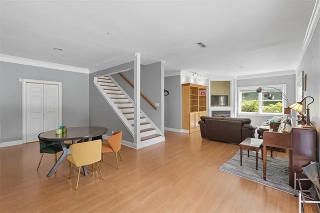 a bathroom with a sink mirror and toilet