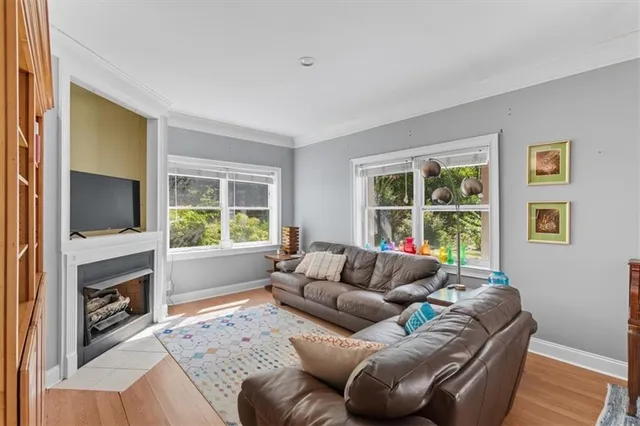 a en suite bathroom with a double vanity sink and a mirror