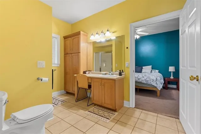 a kitchen with a stove and a refrigerator