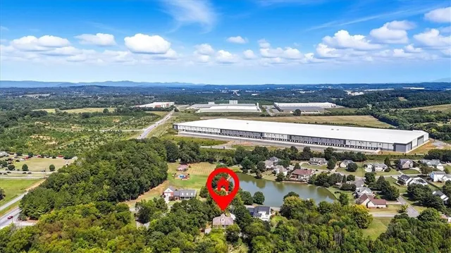 a kitchen with a stove and a refrigerator