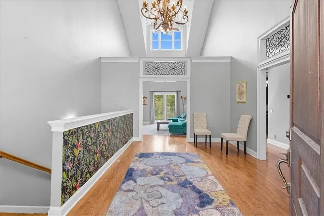 a view of entryway with wooden floor