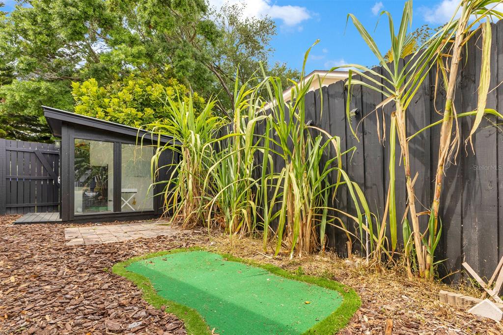 344 Starling Road Winter Park, FL 32789 - Photo 30 of 43 a view of a backyard with a small cabin