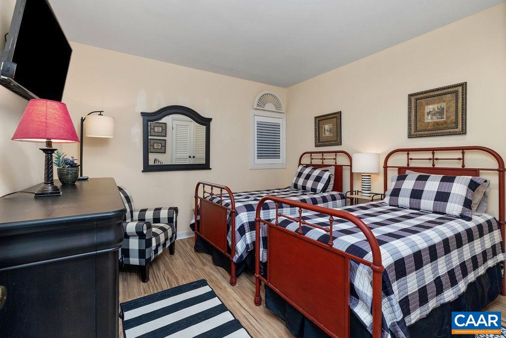 1707 High Ridge Wintergreen, VA 22967 - Photo 15 of 27 a bedroom with two beds and lamp