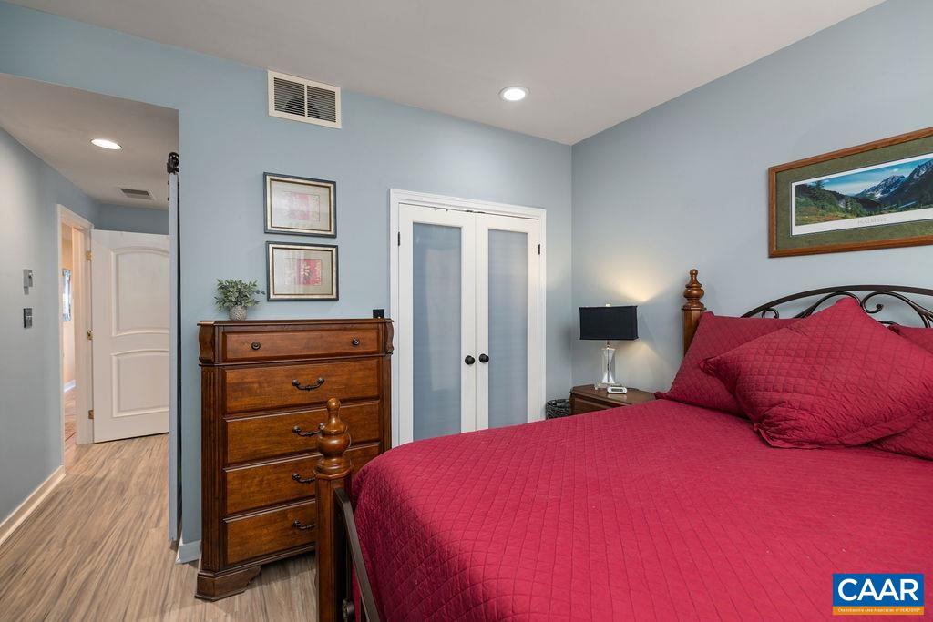 1707 High Ridge Wintergreen, VA 22967 - Photo 19 of 27 a bedroom with a bed and a dresser