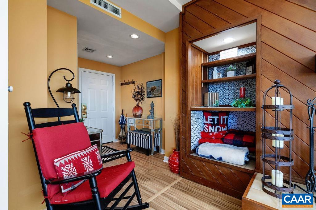 1707 High Ridge Wintergreen, VA 22967 - Photo 2 of 27 a bedroom with furniture and a book shelf