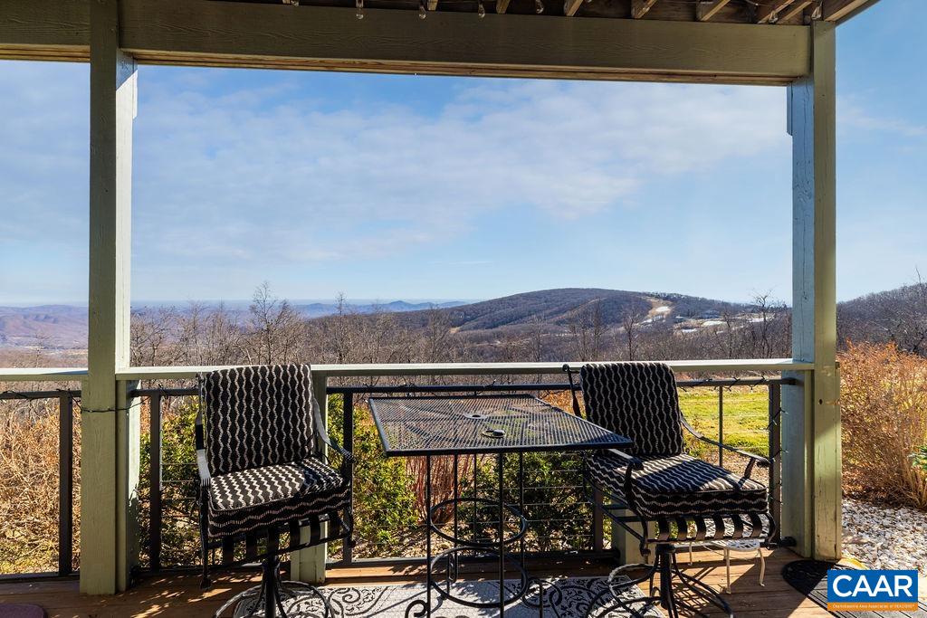1707 High Ridge Wintergreen, VA 22967 - Photo 26 of 27 a view of a chairs and table on the balcony