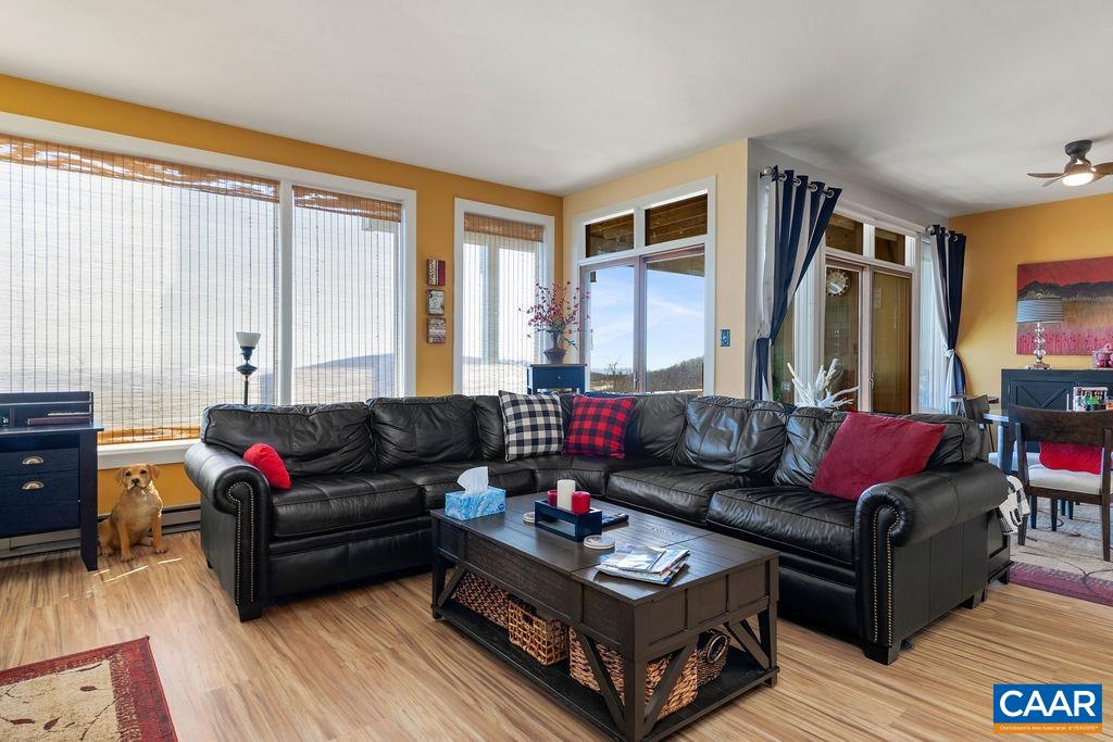 1707 High Ridge Wintergreen, VA 22967 - Photo 6 of 27 a living room with furniture and a flat screen tv
