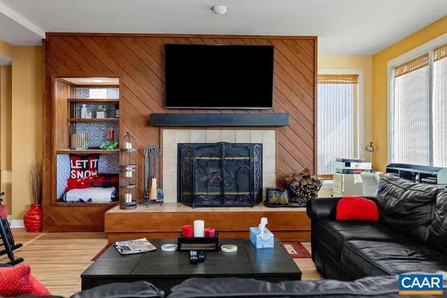 a kitchen with stainless steel appliances granite countertop a sink and a microwave