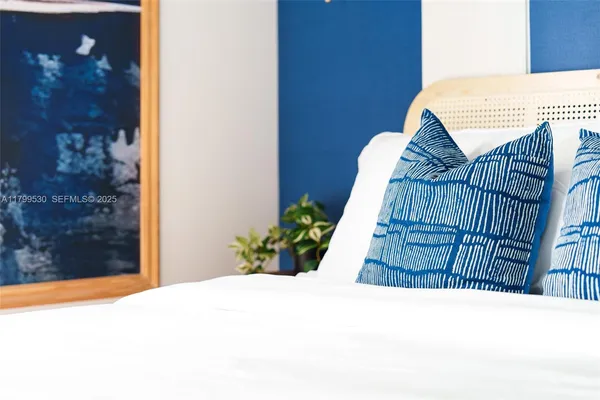 a view of a patio with couches chairs and a fire pit