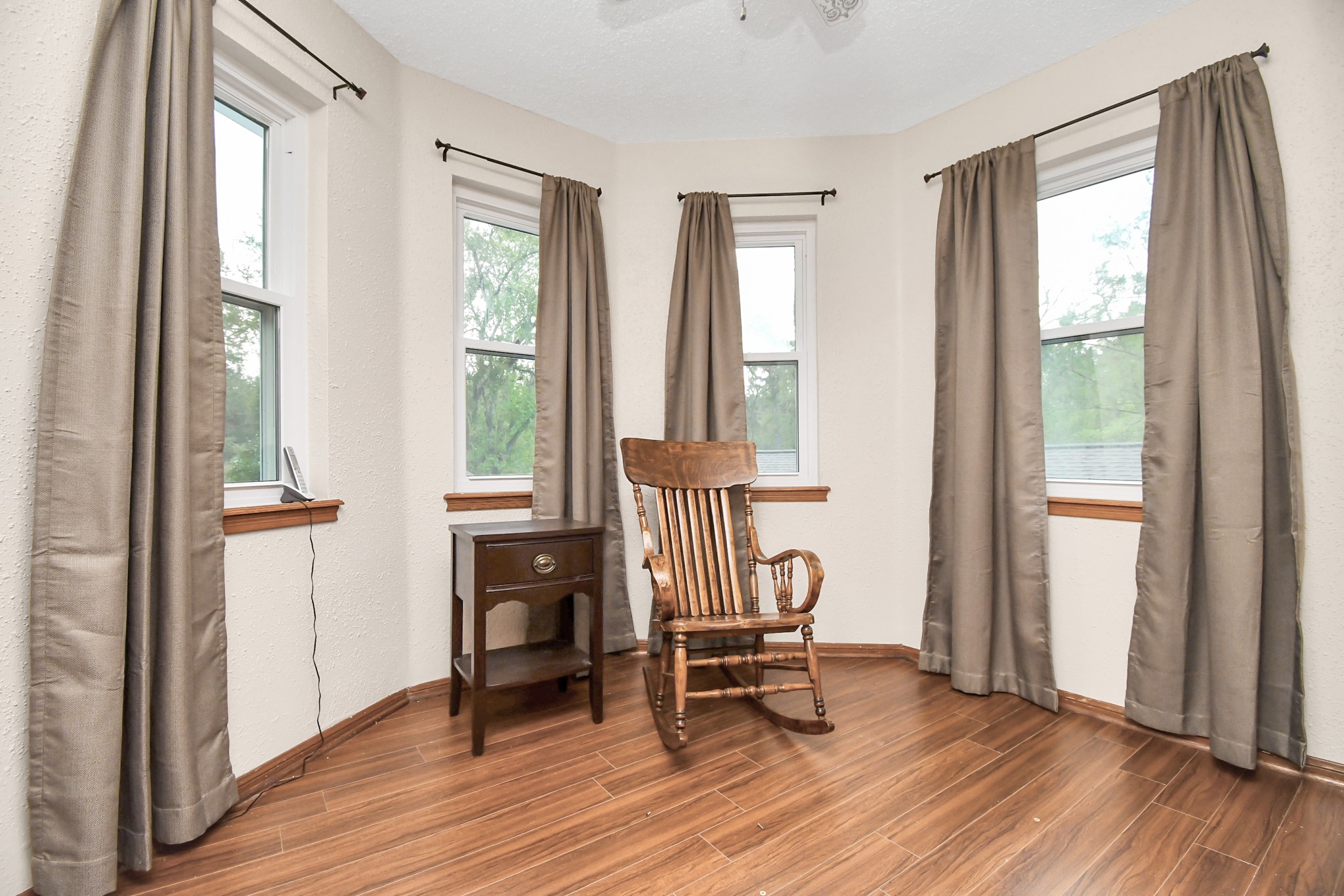 20202 Deer Run Road Damon, TX 77430 - Photo 30 of 45 a view of a room with wooden floor and windows