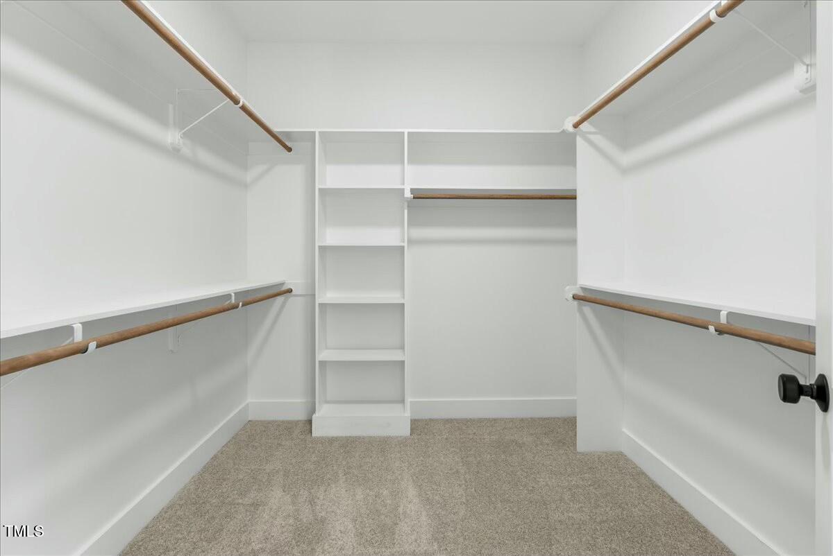 109 Averly Court Stem, NC 27581 - Photo 24 of 36 a view of an empty walk in closet