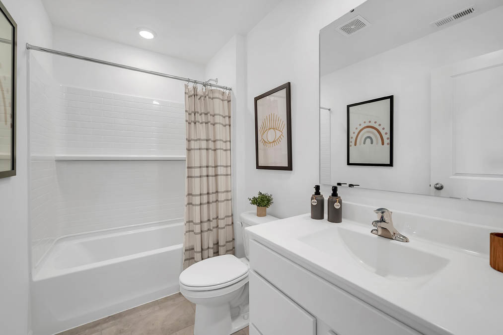 263 Canal Drive St. Charles, IL 60174 - Photo 14 of 29 a bathroom with a sink toilet and shower
