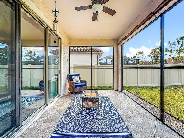 a utility room with furniture and racks