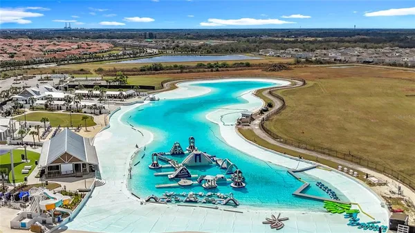 a view of a swimming pool and an outdoor space