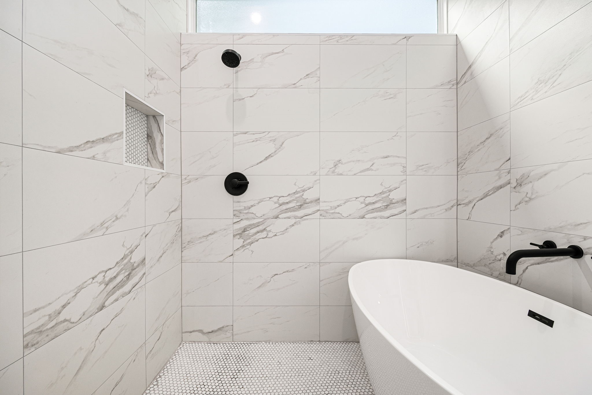 747 Dumble Street Houston, TX 77023 - Photo 9 of 18 a bathroom with a shower