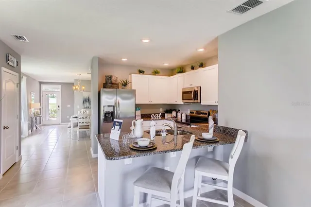 a view of a dining room with furniture