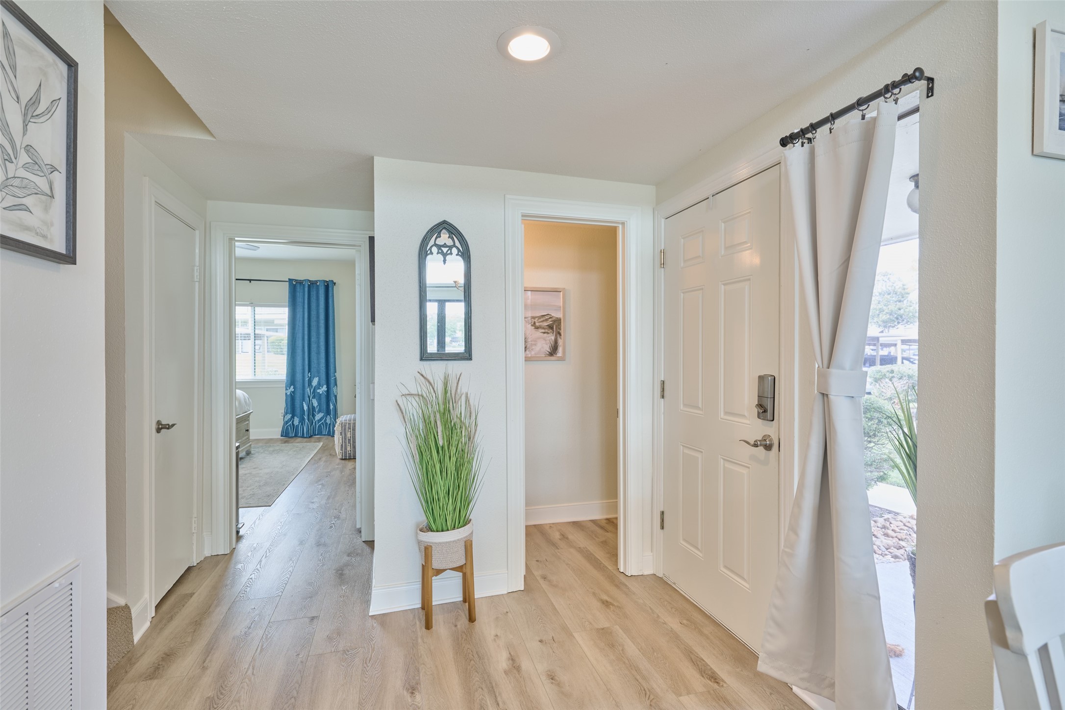 73 April Point Drive South Montgomery, TX 77356 - Photo 20 of 42 Entryway with access to the downstairs primary bedroom.