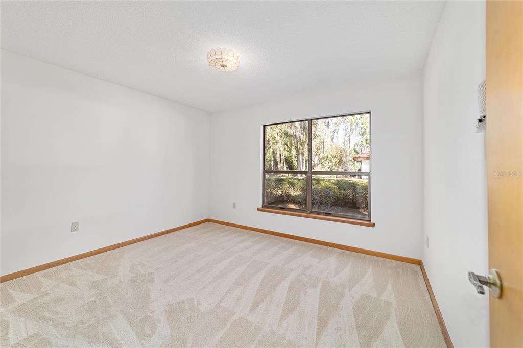 2416 Southeast 15th Street Ocala, FL 34471 - Photo 67 of 98 an empty room with large window